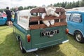 Soft toy stuffed animal sheep lamp in the back of a classic commercial vehicle car