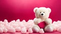 A soft toy white fluffy bear holding a heart on a pink background