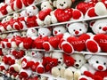 Soft toys in the form of bears with hearts in their paws. Gift for the holiday.