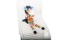 Soft toys zebra sitting in the chair