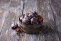 Soft vegan steamed chocolate gingerbread cookies with icing sugar in vintage bowl on wooden table Royalty Free Stock Photo