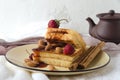 Soft waffles jam almonds yellow round plate