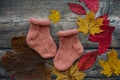 Soft and warm baby socks on dark background