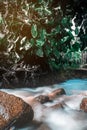 Soft water of the stream in the natural park, Beautiful waterfall in rain forest Royalty Free Stock Photo