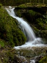 Soft waters running on rocks. Close-up of running water as a picture background Royalty Free Stock Photo