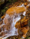 Soft waters running on rocks. Close-up of running water as a picture background Royalty Free Stock Photo