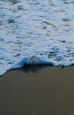Soft Wave Of Blue Ocean On Sandy Beach. For using background. Selective focus. Sea Beach and Soft wave of blue ocean. Royalty Free Stock Photo
