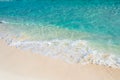 Soft wave of the turquoise sea on the sandy beach