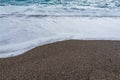 Soft waves foam in blue ocean italy coast, summer evening as background Royalty Free Stock Photo