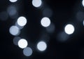 Soft white bokeh lights with shallow depth on gray background Royalty Free Stock Photo