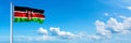 Kenya Flag - state of Africa, flag waving on a blue sky in beautiful clouds - Horizontal banner Royalty Free Stock Photo