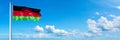 Malawi Flag - state of Africa, flag waving on a blue sky in beautiful clouds - Horizontal banner