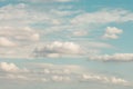 Soft white clouds formation on light blue pastel sky