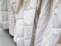 Soft white duvets a lot Royalty Free Stock Photo