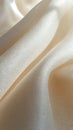 Soft white fabric gracefully draped, highlighting delicate texture and subtle sheen