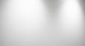 Soft white textured background with two diffused bright spotlights creating a gentle gradient of light and shadow Royalty Free Stock Photo