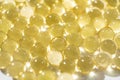 soft yellow gelatine capsules. close-up. pharmaceutical production. Royalty Free Stock Photo