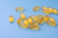 Soft yellow jelly chewable pills filled by fish oil as a source of Omega 3. Capsules