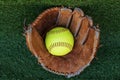 The softball ball in the softball glove has space for text