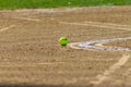 Softball on the dirt Royalty Free Stock Photo