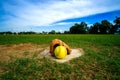 Softball and glove on Homepage and View of a Softball Field from Home Plate Royalty Free Stock Photo