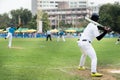 Softball pitcher throwing the curve ball to the batter. Royalty Free Stock Photo