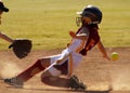 Softball player sliding Royalty Free Stock Photo