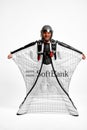 SoftBank. Men in wing suit equipment.Demonstration of popular brands. Simulator of free fall.