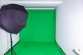 Softbox in a photostudio with a green screen