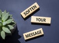 Soften your Message symbol. Concept words Soften your Message on wooden blocks. Beautiful deep blue background with succulent