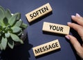 Soften your Message symbol. Concept words Soften your Message on wooden blocks. Beautiful deep blue background with succulent