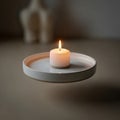 Softly blurred emphasizing the candle and its elegant minimalistic presentatio Royalty Free Stock Photo