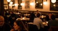 Blurred View of People Dining in a Warmly Lit Restaurant with Hanging Pendant Lights bokeh Royalty Free Stock Photo
