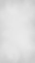 Softly blurred white and light gray background with a gentle gradient and subtle texture creating a clean and airy diffused Royalty Free Stock Photo