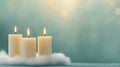 Softly glowing candles rest on fluffy white cloud-like base. Serene ambience, calm lighting create symbolic representation of