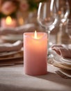 Softly Glowing Pink Candle Illuminating a Candlelit Dinner Table with Elegant Tableware and Romantic Atmosphere Royalty Free Stock Photo