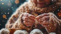 In softly lit environment elderly hands are carefully knitting soft woolen scarf using wooden needles Royalty Free Stock Photo