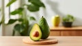 In the softly lit kitchen, avocados sit on the wood table. Generative AI