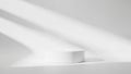 Softly Lit Minimalist White Cylindrical Podium on Gradient Light Gray Background Royalty Free Stock Photo