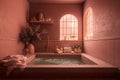 Softly lit spa in warm pink tones. Spa relaxation - burned candle floating in rose water.