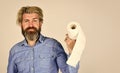 Softness strength and absorbency. Prevent Toilet Paper Hoarding. Man hold toilet paper. Hipster with tissue. limit usage Royalty Free Stock Photo