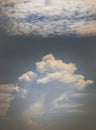 The softness of the white clouds, and sky with the light shining from an interesting light pattern against the sky Royalty Free Stock Photo