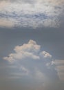 The softness of the white clouds, and sky with the light shining from an interesting light pattern against the sky Royalty Free Stock Photo
