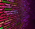 Software background technology. Minificated web development javascript code close up in sunset rays. Software developer Royalty Free Stock Photo