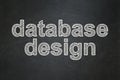 Software concept: Database Design on chalkboard background