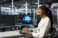 Software developer in data center uses headset mic to provide user tech support Royalty Free Stock Photo