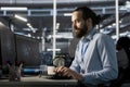 Software developer in data center using AI powered tech to run simulations Royalty Free Stock Photo
