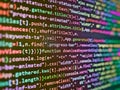 Software developer programming code on computer monitor. Coding in object oriented programming. Technology display. Strong vintage Royalty Free Stock Photo
