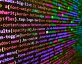 Software developer programming code on computer monitor. SEO optimization. Programming code screen of software developer. Vignette Royalty Free Stock Photo
