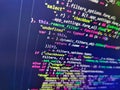 Software developer programming code. Screen of web developing code on dark background. Closeup of Web Code on Computer LED Screen Royalty Free Stock Photo